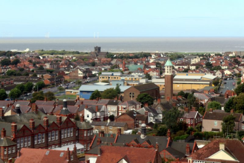 Panoramic view of part of Wallasey village, looking towards the coast. Includes the rear of St George