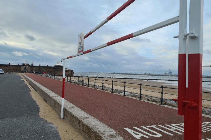 Height barrier with Fort Perch Rock in background